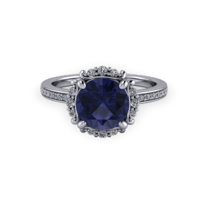 Vintage white gold sapphire and diamond bespoke halo engagement ring