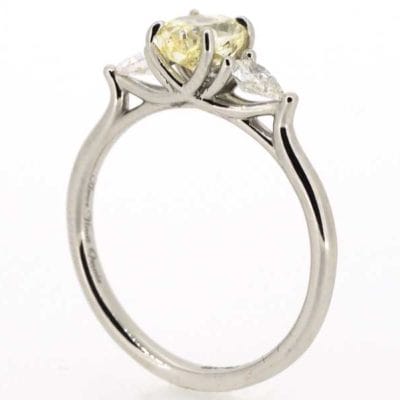 Three stone yellow diamond ring