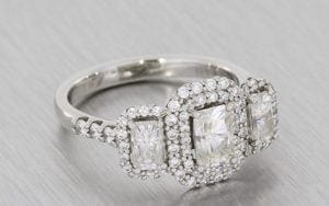 Platinum Three Stone Moissanite And Diamond Halo Ring - Portfolio