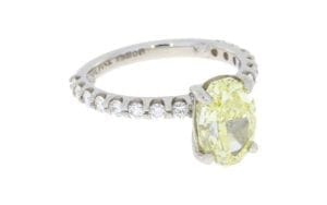 Natural Fancy Yellow Oval Diamond with Fishtail Set and Diamond Accent Stones - Portfolio