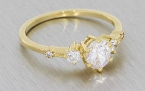 A Delicate Three Stone Engagement Ring Set Diamonds