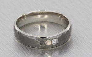 Hammered Men's Contemporary Wedding Band With A Bezel Set Asscher Cut Diamond